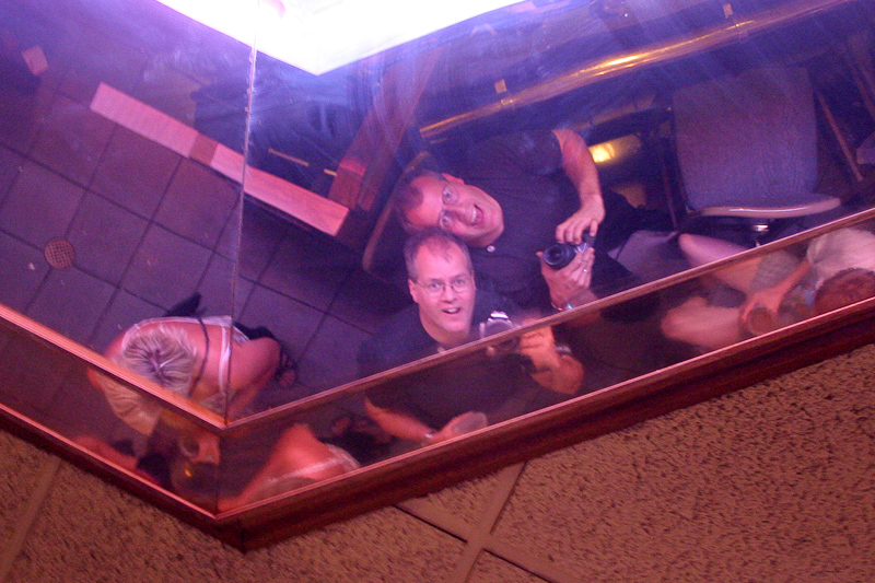 August 05, 2004@23:04<br/>John and I fool around with the mirror above the bar