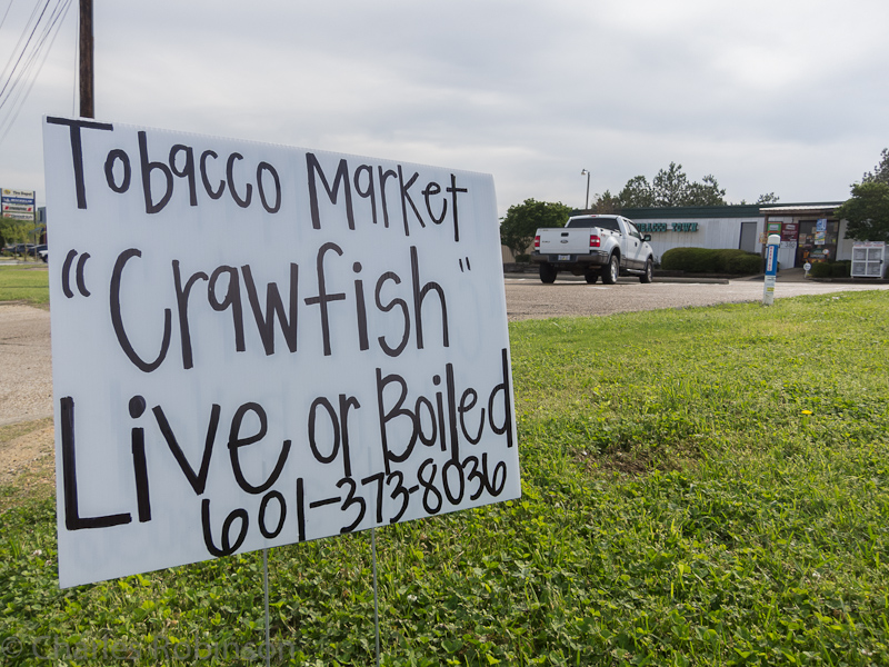 Just outside of Jackson, Mississippi.  Tobacco shop with Crawfish (live or boiled).  Interesting combo.<br />March 19, 2012@10:10