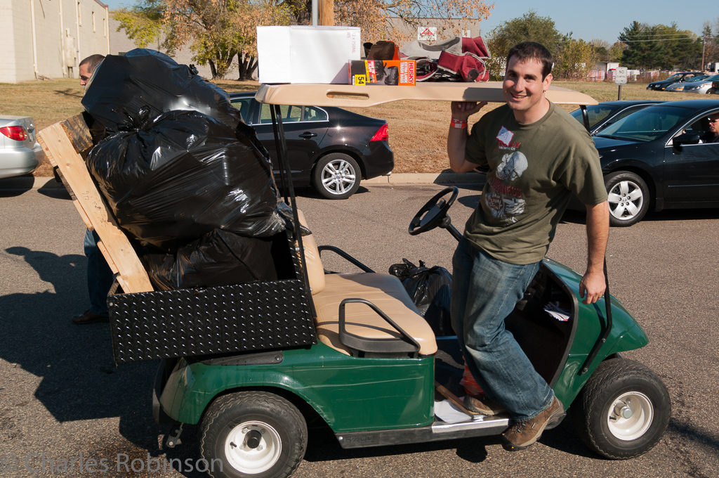 Bill on the AWESOME GOLF CART with a full load of cans and bottles from the street.<br />October 22, 2011@11:49