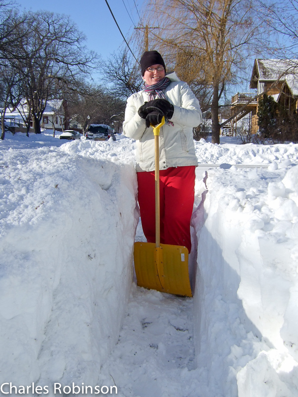 December 12, 2010@12:38<br/>Melissa and I tag-teamed to get the hip-high pile of snow under control so people can use the sidewalks