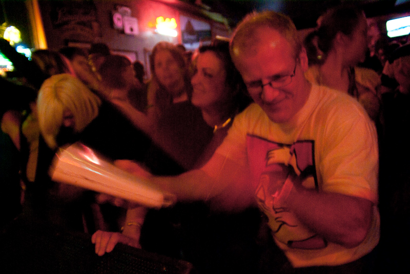 March 14, 2010@01:15<br/>Towards the end of the show, John grabbed the cowbell and whacked it for all he was worth