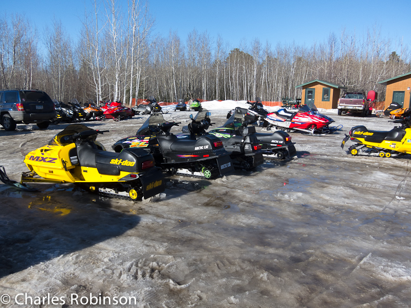 Nothing but icey SLUSH in the parking lot!  50+ degrees outside, this is the last day for snowmobiles up here.<br />March 10, 2012@15:05