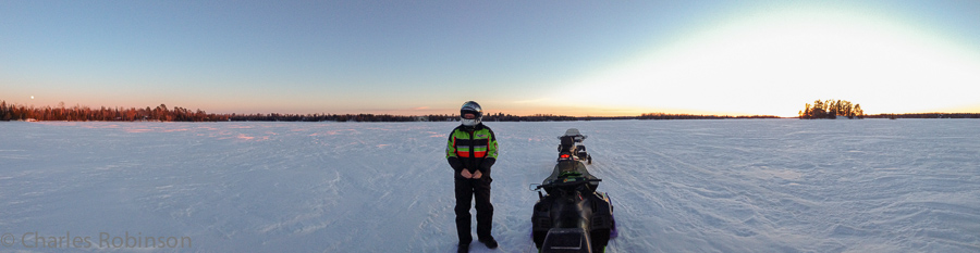 Stopping mid-lake on the way back home.  Moon coming up as the sun is setting.<br />March 15, 2014@19:10