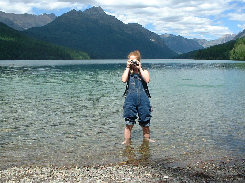 July 19, 2001@15:48<br/>Fiona standing in a lake in Glacier National Park