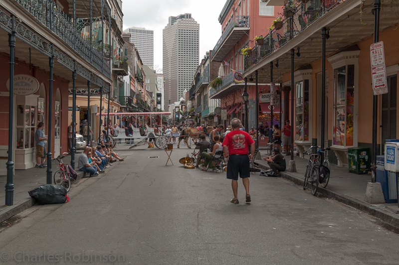 Hippies playing music in the middle of Royal Street.<br />March 19, 2012@15:17