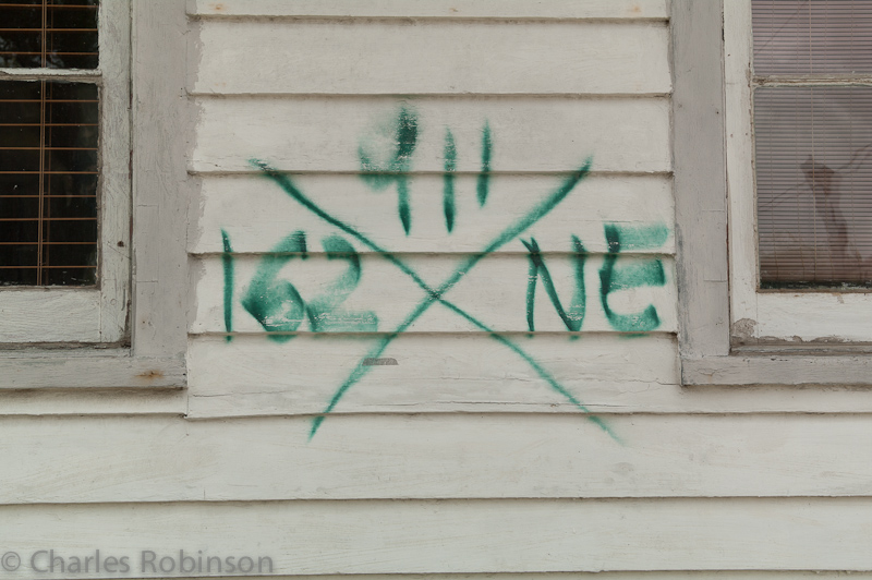 A lot of houses in the St. Roch neighborhood still bear these marks from when the National Guard went through to clear people out ahead of Hurricane Katrina.<br />March 20, 2012@12:29