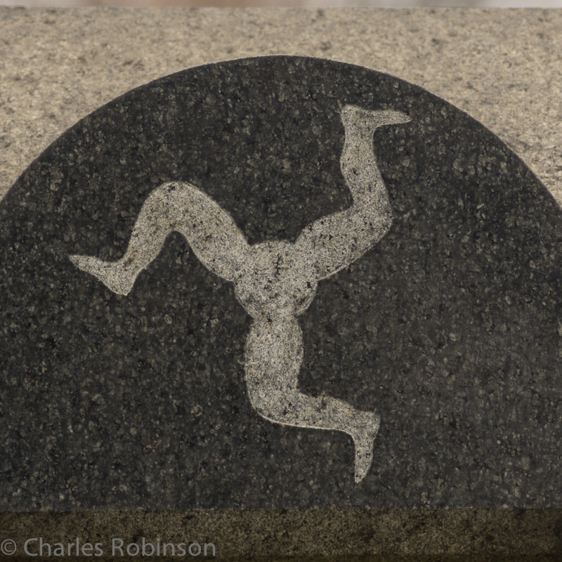 Funky three-legged artwork on a stone.<br />December 13, 2014@12:07