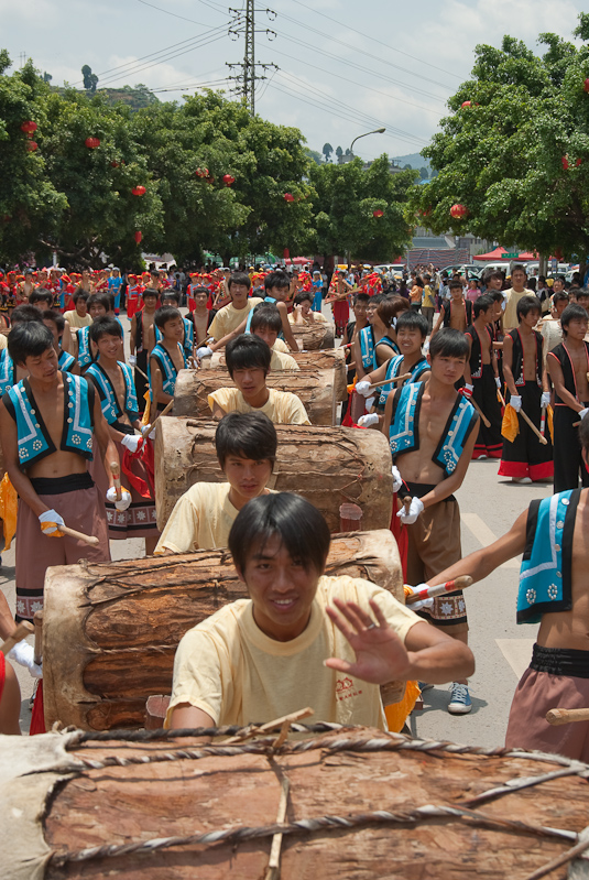 May 01, 2010@13:02<br/>The drum section was lined up about 50 feet behind us in the parade so we went back to take a photo of them.  They all started drumming when they saw the cameras.