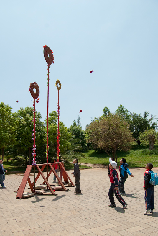 April 29, 2010@12:09<br/>In this game, kids are trying to toss beanbags through the holes.  Surprisingly difficult!