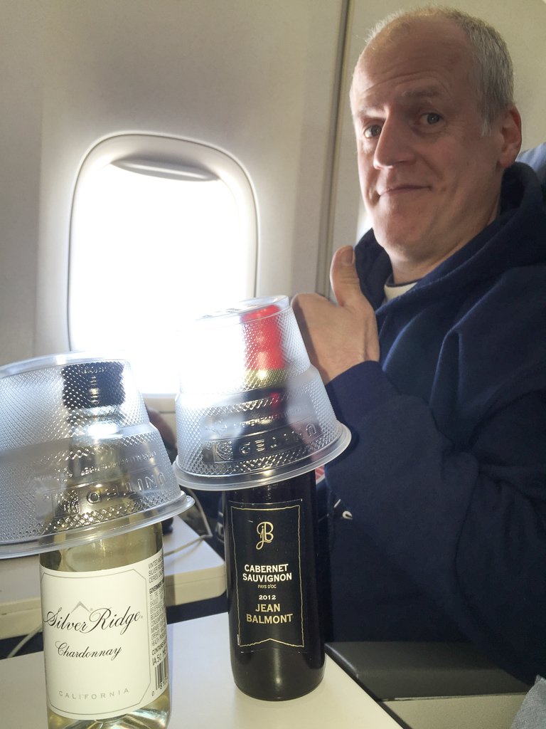Finally up in the air - booze was free for the entire trip as partial compensation for the 3-hour delay.<br />April 28, 2015@15:12
