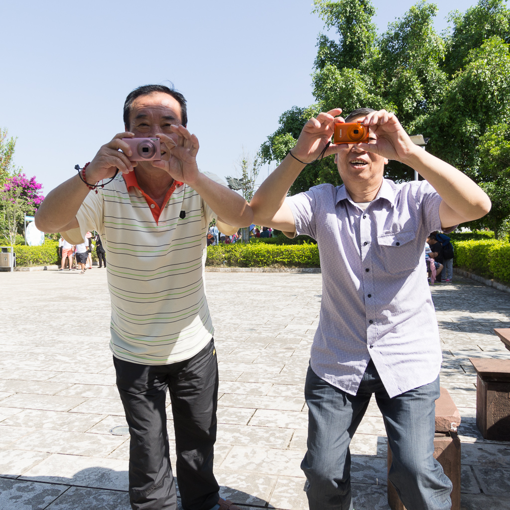 John and I stepped out from behind a bush (after photographing the trees we'd planted) and these guys jumped up and asked for photos of us.<br />May 01, 2015@10:14