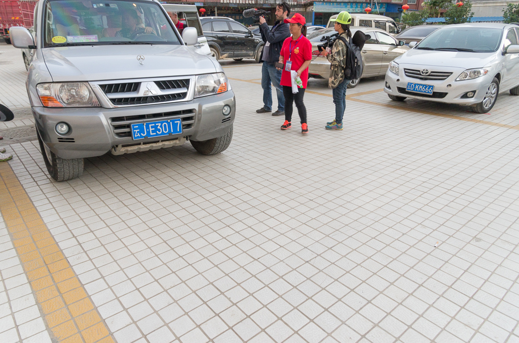 The driveway behind the hotel (and MOST driveways that aren't just dirt) was not cement or blacktop - but tile!<br />May 01, 2015@19:43