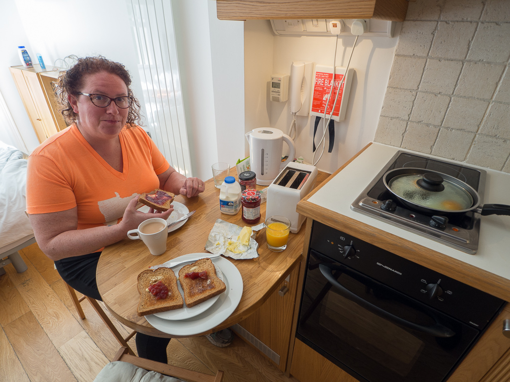 Standard breakfast getup - tea, toast, eggs, juice.  Cozy!<br />May 10, 2017@10:19