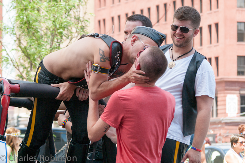 Ah!  Now I know why.  The guy in the red shirt came back to the sidewalk completely flushed red.  But smiling.<br />June 24, 2012@12:56