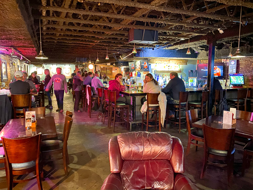 Cozy basement pub - with smoking allowed (grandfathered in).  Melissa got the woman next to her to flip me off, too.