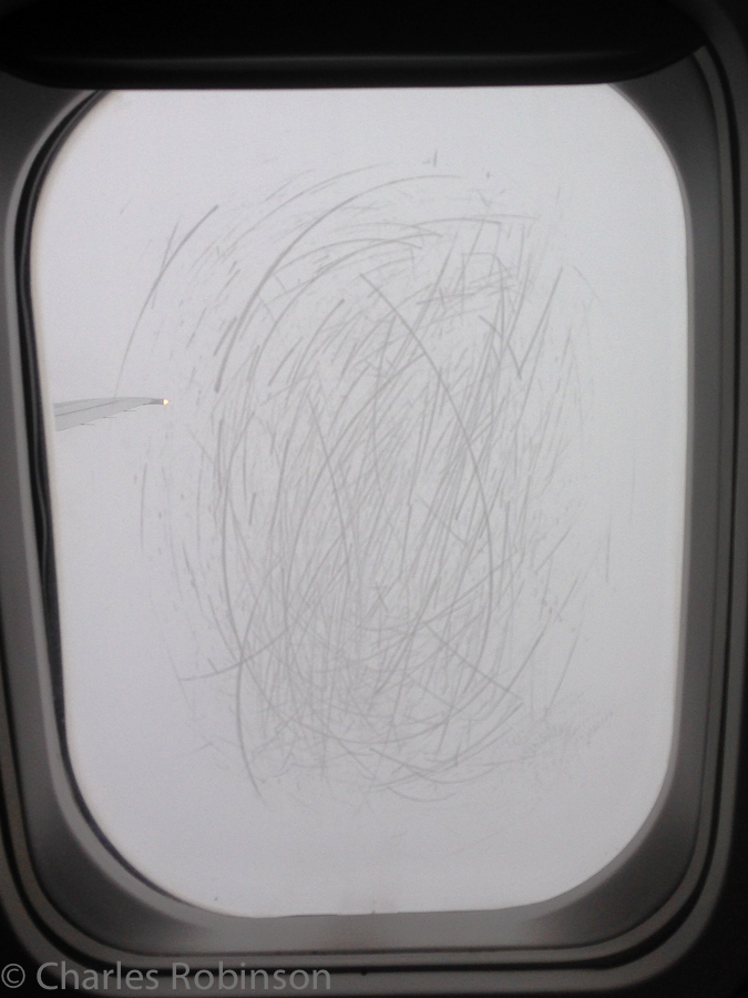 Delta worked really hard to make sure there was no way to see the view out of the windows.<br />September 28, 2013@12:31