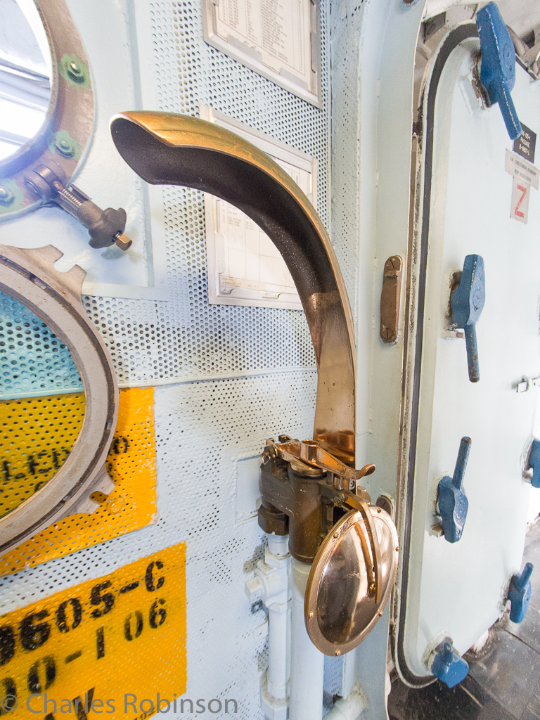 A pneumatic tube for sending messages.  I like the swoopy bit at the top which keeps the tube from shooting up to the ceiling should there be a problem.<br />December 19, 2015@11:51