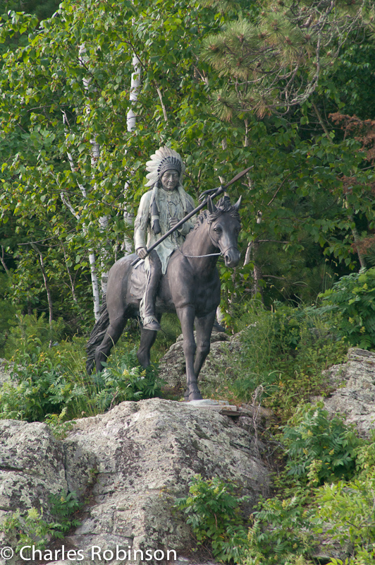 Sculpture out on a point in front of a cabin - fancy!<br />July 08, 2011@17:50