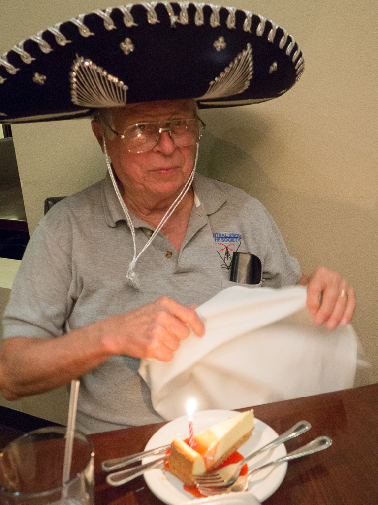 Surprise!  They came out with a sombrero and slice of cheesecake for his birthday.  And they sang.  Nice.<br />February 07, 2017@19:05