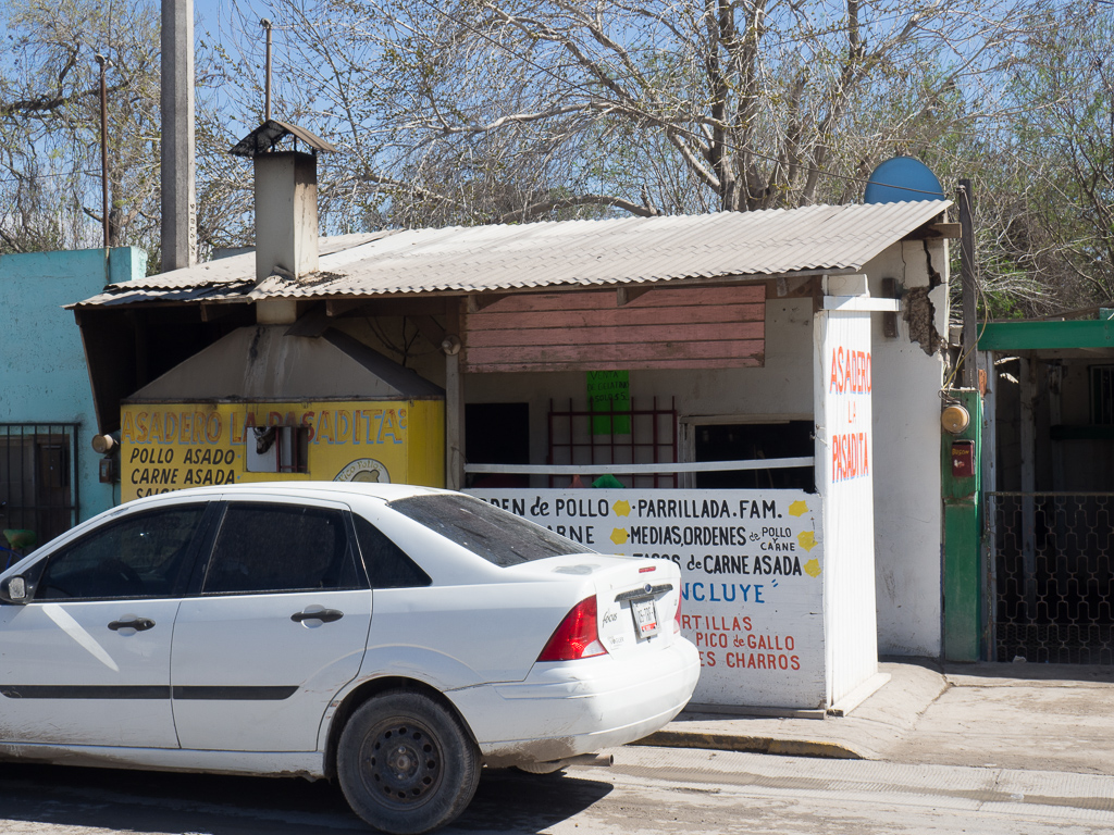 I photographed this building back in 2008, I think, when it was a car-repair shop.   Now it's a taco stand.  Interesting.<br />February 10, 2018@12:03