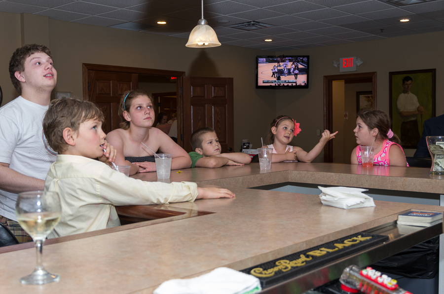 The kids all hanging around the bar... of course.  Train 'em young!<br />June 16, 2013@20:14