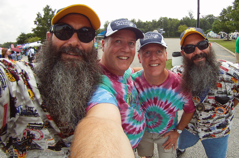 Selfie!  The two of us on the left are each holding up our cameras.  Funny that John and I are looking at Don and Dave's camera, while they're both looking at mine.<br />August 03, 2014@13:43