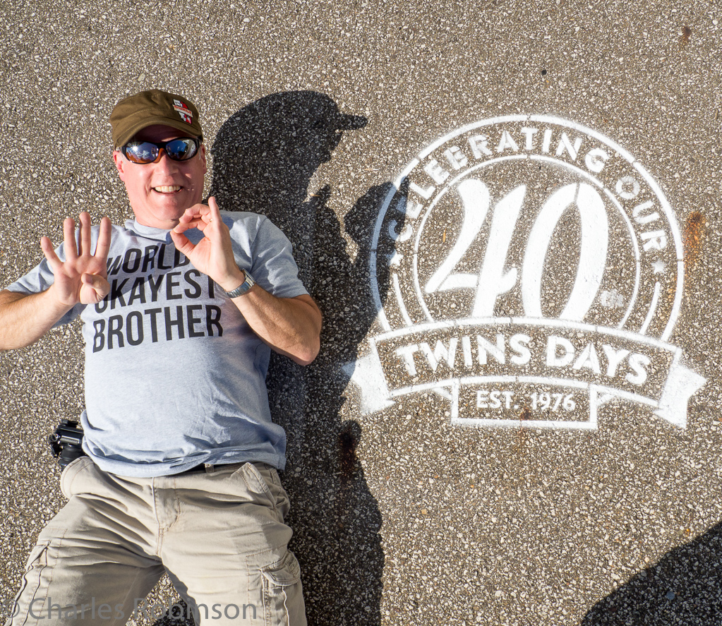 John poses by a sidewalk stencil<br />August 05, 2015@10:15