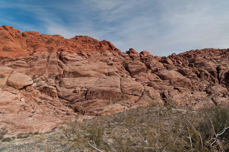 Red Rock Canyon.  If you look closely, the little black dot on the left-hand side is a person.<br />December 12, 2012@12:17