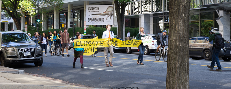 While having breakfast the next morning, a protest went by.  It was sparsely attended - you can see in this photo just about every participant.<br />September 23, 2014@10:53